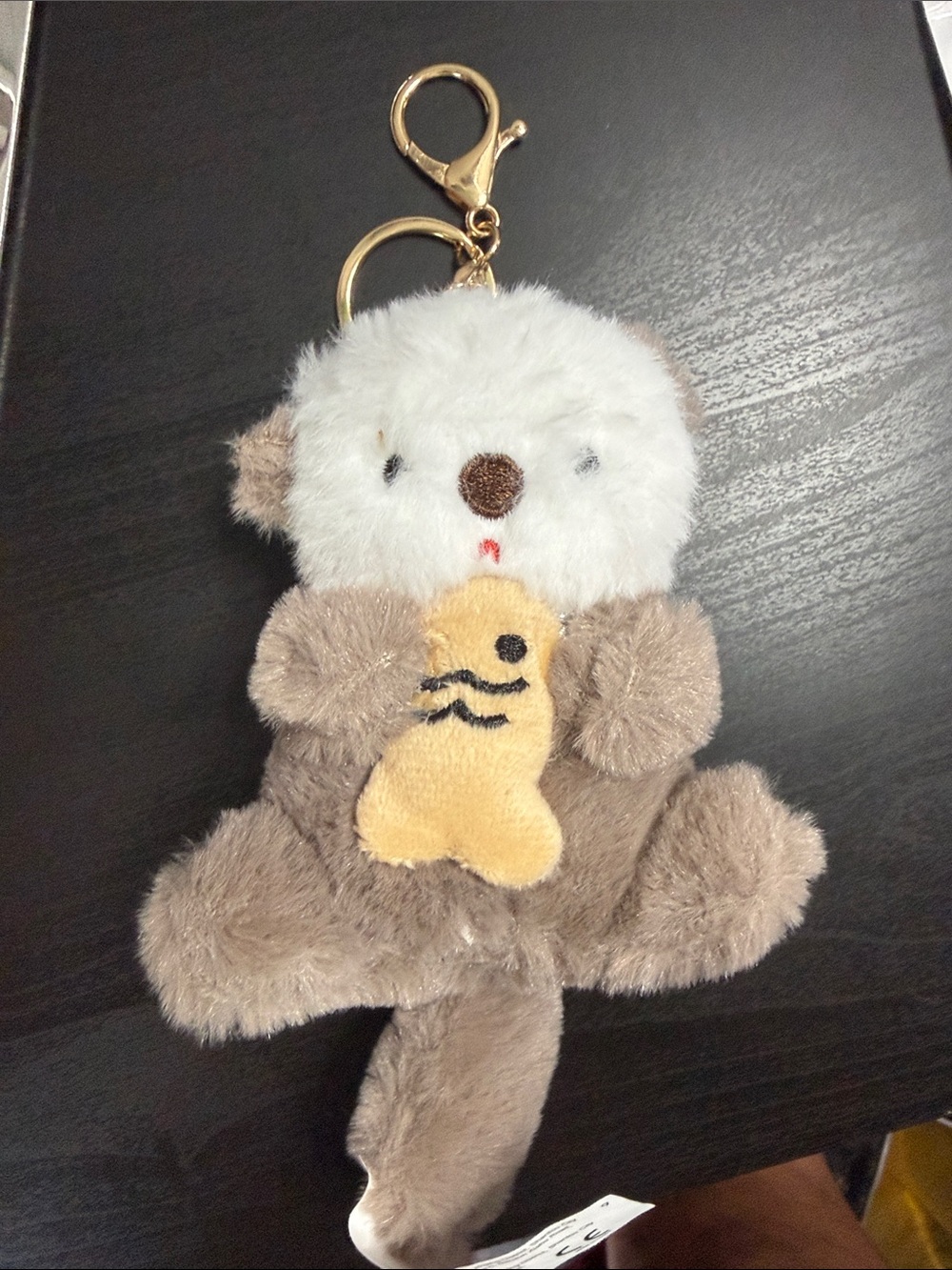 Plush Otter Keychain with Yellow Fish